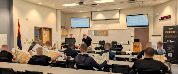 During the SOLID UAVS 2-Day Part 107 Test Prep Course we prepare participants to successfully pass their Part 107 Test. In this image the instructor is helping participants master the reading of Sectional Charts. It is crucial to have full situational awareness of surrounding airspace and obstructions prior to each UAS mission. This will ensure compliance with FAA regulations and enhance safety of team members and non-participants. Public Safety and Commercial Operators are held to a higher standard than Recreational Flyers. Our goal is not to just make you a really good test-taker, but our primary goal is to make you a knowledgeable and well-rounded Remote Pilot that can safely operate in the National Airspace System.